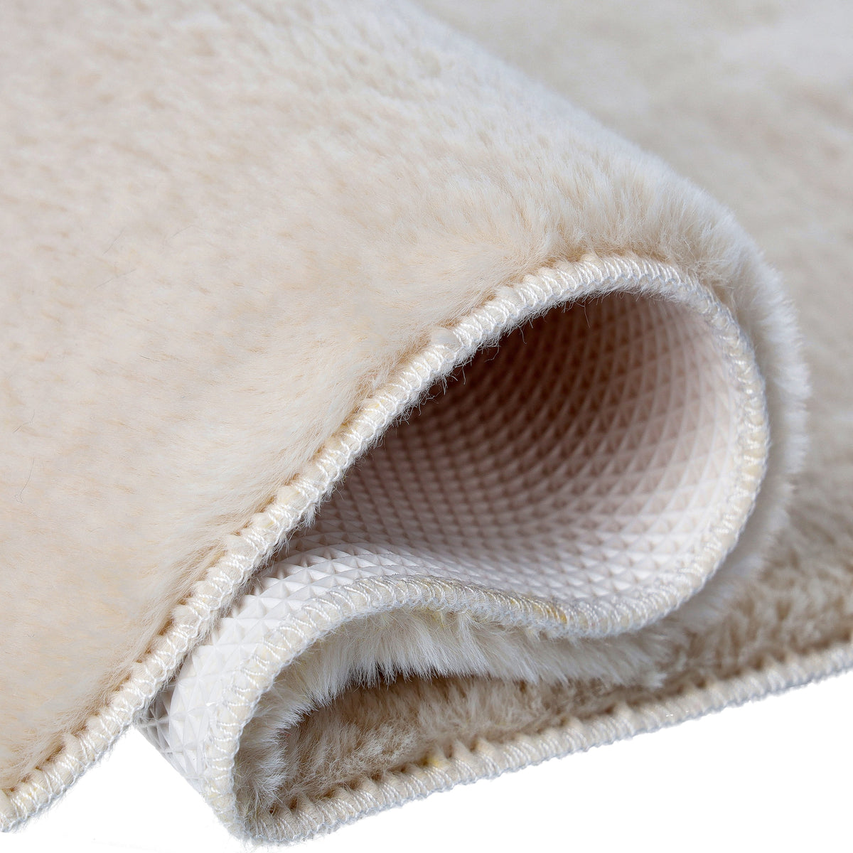 beige kylpyhuonematto paradise lähikuva